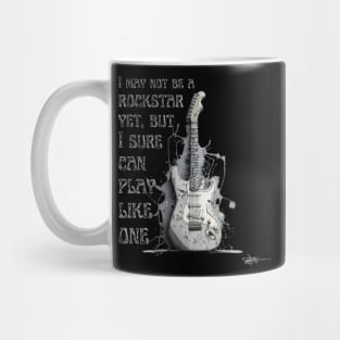 I may not be a rockstar yet, but I sure can play like one. Guitar. Mug